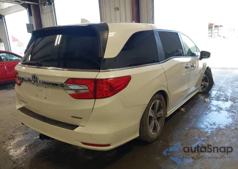 2018 Honda Odyssey Touring z USA, uszkodzony, nr VIN 5FNRL6H84JB020671